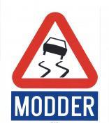 Modder op de weg